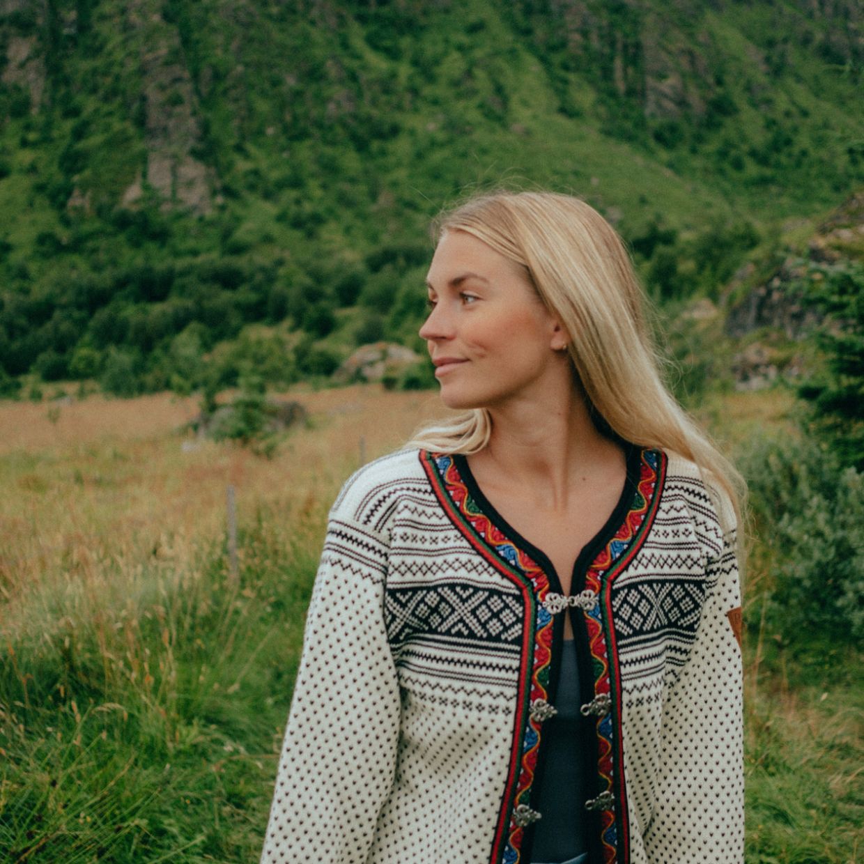 Young blonde influencer Fie Agerskov wearing a traditional Norwegian knitted sweater