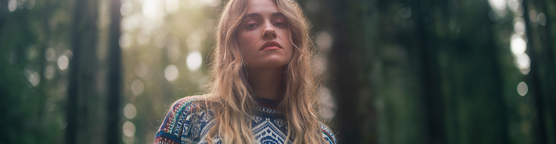 The Norwegian artist SKAAR wearing the iconic 1994 sweater from the Winter Olympics in Lillehammer.