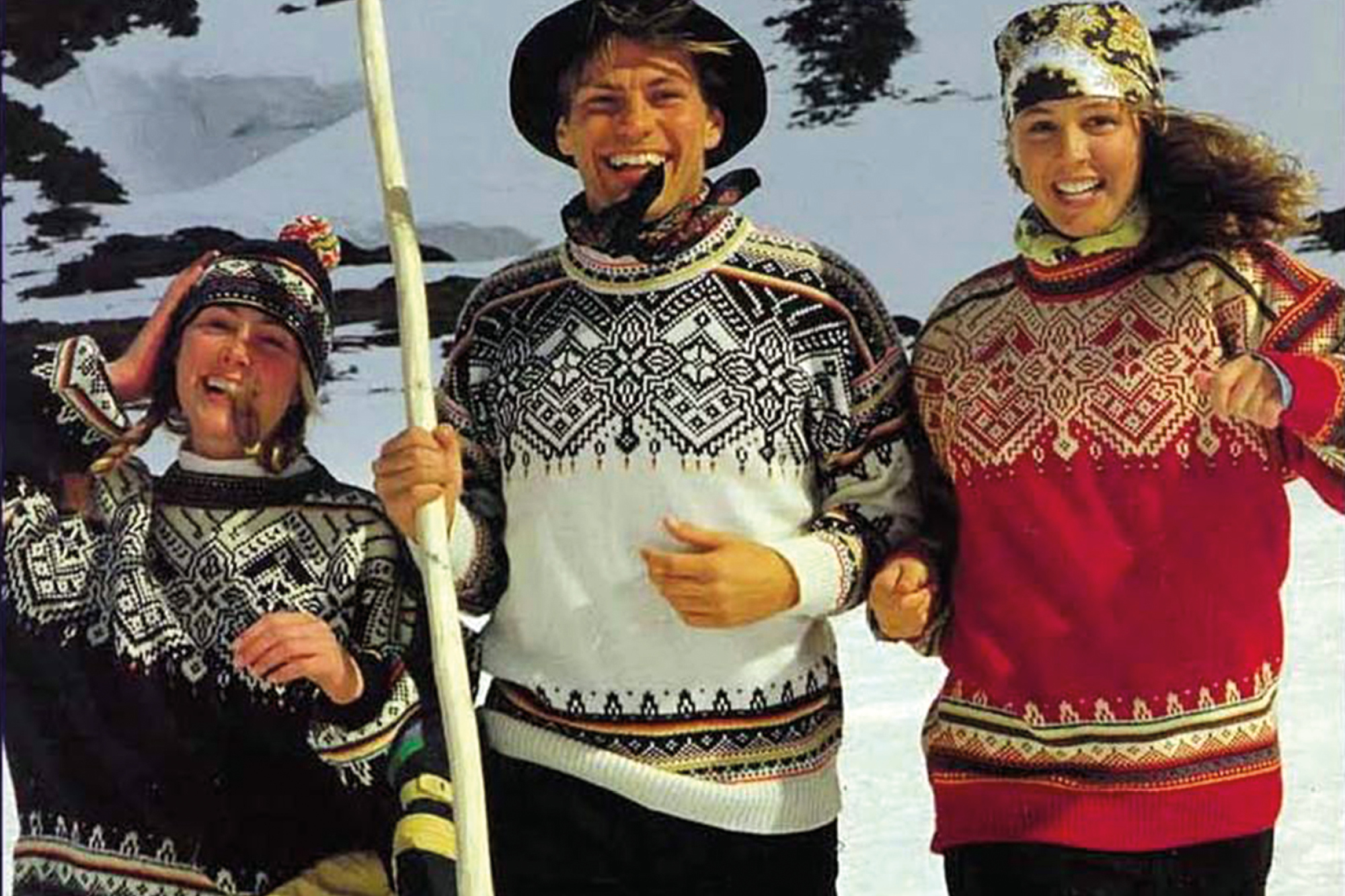 happy models wearing the 1991 world ski championship sweater. 1990s – Reflecting the Host Cities This decade embraced storytelling. Sweaters were shaped not only by tradition but by cultural references tied to the championship’s host location and era.